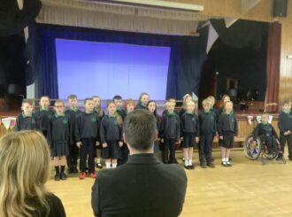 P5 sing Fr Conor's favourite hymn